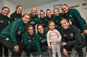 27 Novmeber 2023; Republic of Ireland's players, back row, from left, Freya Healy, Ellen Dolan, Courtney Brosnan, Sinead Farrelly, Lucy Quinn, Hayley Nolan and Erin McLaughlin; front row, from left, Saoirse Noonan, Chloe Mustaki, Heather Payne, and Denise O'Sullivan, with Duvheasa Finneran, age 2, from Toberconor, Roscommon, during a visit to Cappagh Kids and The National Orthopaedic Hospital Cappagh in Dublin to launch the Cappagh Hospital Foundation Christmas Appeal and their fundraising ambassador Boney Maloney. Photo by Ramsey Cardy/Sportsfile