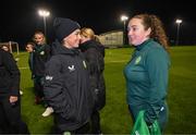 28 November 2023; Republic of Ireland's Katie McCabe with Georgia May Barry of the Ireland women's cerebral palsy team, who were recently crowned champions of the International Federation of CP Football Nations League for 2023, at the FAI National Training Centre in Abbotstown, Dublin. Photo by Stephen McCarthy/Sportsfile