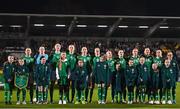 1 December 2023; The Republic of Ireland sqaud, from left, Katie McCabe, Courtney Brosnan, Louise Quinn, Caitlin Hayes, Megan Connolly, Ruesha Littlejohn, Denise O'Sullivan, Tyler Toland, Heather Payne, Kyra Carusa, and Izzy Atkinson stand for the national anthem before the UEFA Women's Nations League B match between Republic of Ireland and Hungary at Tallaght Stadium in Dublin. Photo by Ben McShane/Sportsfile