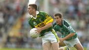 11 July 2004; Marc O'Se, Kerry, in action against Conor Fitzgerald, Limerick. Bank of Ireland Munster Senior Football Championship Final, Limerick v Kerry, Gaelic Grounds, Limerick. Picture credit; Brendan Moran / SPORTSFILE