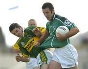 11 July 2004; John Galvin, Limerick, in action against Aidan O'Mahony, Kerry. Bank of Ireland Munster Senior Football Championship Final, Limerick v Kerry, Gaelic Grounds, Limerick. Picture credit; Brendan Moran / SPORTSFILE