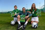 7 September 2013; Republic of Ireland's John O'Shea with Kelley Doherty, age 10, and Paraic Doyle, age 10, at the launch of the FAI Child Welfare Policy. Gannon Park, Malahide, Co. Dublin. Picture credit: David Maher / SPORTSFILE