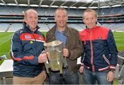 7 September 2013; On the eve of the All-Ireland Hurling Final, Clare hurling legend Jamesie O’Connor gave a unique tour of Croke Park stadium as part of the Bord Gáis Energy Legends Tour Series. Pictured holding the Liam MacCarthy Cup at the tour are Mike O'Donovan, left, Jamesie O’Connor and Dave O'Donovan, from Clonakilty, Co. Cork. The Final Bord Gáis Energy Legends Tour of the year will take place on Saturday, 21st September and will feature former Mayo player, Willie Joe Padden. Full details are available on www.crokepark.ie/events. Croke Park, Dublin. Picture credit: Barry Cregg / SPORTSFILE