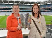 7 September 2013; On the eve of the All-Ireland Hurling Final, Clare hurling legend Jamesie O’Connor gave a unique tour of Croke Park stadium as part of the Bord Gáis Energy Legends Tour Series. Pictured holding the Liam MacCarthy Cup at the tour are Terrie O'Rourke, left, and Colette Lynch, from Lissycasey and Kildysart, Co. Clare. The Final Bord Gáis Energy Legends Tour of the year will take place on Saturday, 21st September and will feature former Mayo player, Willie Joe Padden. Full details are available on www.crokepark.ie/events. Croke Park, Dublin. Picture credit: Barry Cregg / SPORTSFILE