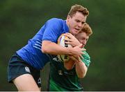 7 September 2013; Cormac Brennan, Leinster, is tackled by Fionn Higgins, Connacht. Under 19 Interprovincial, Leinster v Connacht, Templeville Road, Dublin. Photo by Sportsfile