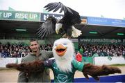 7 September 2013; Alex Nuschketat, Ballymote, with his Bald eagle from North America named Alaska with Eddie the Eagle at the Connacht v Zebre game. Celtic League 2013/14, Round 1, Connacht v Zebre, Sportsground, Galway. Picture credit: Ray Ryan / SPORTSFILE
