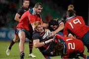 7 September 2013; Roddy Grant, Edinburgh, is tackled by Cathal Sheridan and James Cronin, left, Munster. Celtic League 2013/14, Round 1, Munster v Edinburgh Rugby, Musgrave Park, Cork. Picture credit: Diarmuid Greene / SPORTSFILE