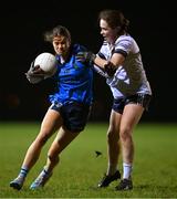7 December 2023; Aisling Walls of UCD in action against Lauren Garland of UL during the 3rd Level Ladies Football League Division 2 final match between UCD and Ulster University at Dundalk Institute of Technology in Dundalk, Louth. Photo by Ben McShane/Sportsfile