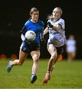 7 December 2023; Aisling Walls of UCD in action against Erin Sands of UL during the 3rd Level Ladies Football League Division 2 final match between UCD and Ulster University at Dundalk Institute of Technology in Dundalk, Louth. Photo by Ben McShane/Sportsfile