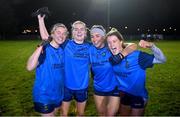 7 December 2023; UCD players, from left, Saoirse Lally, Sarah Doyle, Michaela Keogh and Aisling Walls celebrate after the 3rd Level Ladies Football League Division 2 final match between UCD and Ulster University at Dundalk Institute of Technology in Dundalk, Louth. Photo by Ben McShane/Sportsfile