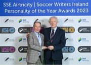 8 December 2023; Phil Mooney is presented with the Liam Tuohy Special Merit award by Brian Kerr during the SSE Airtricity / Soccer Writers Ireland Awards 2023 at the Dublin Royal Convention Centre in Dublin. Photo by Stephen McCarthy/Sportsfile