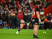 9 December 2023; Jack Crowley of Munster attempts a last minute drop goal, while wearing only one boot, during the Investec Champions Cup Pool 3 Round 1 match between Munster and Aviron Bayonnais at Thomond Park in Limerick. Photo by Brendan Moran/Sportsfile