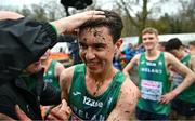 10 December 2023; Jonas Stafford of Ireland celebrates after Ireland won team gold in the U20 men's 5000m during the SPAR European Cross Country Championships at Laeken Park in Brussels, Belgium. Photo by Sam Barnes/Sportsfile