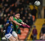 10 December 2023; Eunan Mulholland of Glen palms a shot at goal despite the attention of Conor McCarthy of Scotstown during the AIB Ulster GAA Football Senior Club Championship Final match between Glen of Derry, and Scotstown of Monaghan, at BOX-IT Athletic Grounds in Armagh. Photo by Ramsey Cardy/Sportsfile