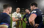 10 December 2023; Ultan Dillane of La Rochelle speaks to Leinster players, from left, Josh van der Flier, Caelan Doris and Ryan Baird after the Investec Champions Cup match between La Rochelle and Leinster at Stade Marcel Deflandre in La Rochelle, France. Photo by Harry Murphy/Sportsfile