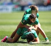 9 December 2023; Ireland players, Amee-Leigh Murphy Crowe, centre, Emily Lane, bottom, and Megan Burns of Ireland during the Women's Pool B match between New Zealand and Ireland during the HSBC SVNS Rugby Tournament at DHL Stadium in Cape Town, South Africa. Photo by Shaun Roy/Sportsfile