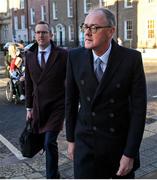 13 December 2023; Former FAI chairperson Roy Barrett, right, and FAI chief operating officer David Courell arrive at Dáil Éireann in Dublin ahead of a meeting with the Oireachtas Committee on Tourism, Culture, Arts, Sport and Media. Photo by David Fitzgerald/Sportsfile