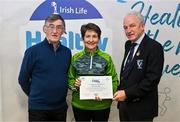 14 December 2023; Melvin Gaels, Leitrim, representative Mary McSharry is presented their Foundation Healthy Club award by Connacht GAA secretary John Prenty, left, and Connacht GAA Council president John Murphy, right, during the Irish Life Connacht GAA Healthy Clubs recognition event at the Connacht GAA Centre of Excellence in Bekan, Mayo. Photo by Ben McShane/Sportsfile