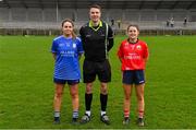 17 December 2023; Referee Ray McBride with team captains Rebecca Kean of Claremorris, left, and Lisa Harte of O'Donovan Rossa before the Currentaccount.ie LGFA All-Ireland Junior Club Championship final match between Claremorris of Mayo and O'Donovan Rossa of Cork at Parnell Park in Dublin. Photo by Ben McShane/Sportsfile