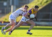 6 January 2024; Gavin Sheehan of Wexford in action against Shane Farrell of Kildare during the Dioralyte O'Byrne Cup quarter-final match between Wexford and Kildare at Chadwicks Wexford Park in Wexford. Photo by Sam Barnes/Sportsfile