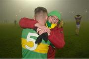 7 January 2024; Eunan Mulholland of Glen celebrates with a supporter after the AIB GAA Football All-Ireland Senior Club Championship semi-final match between Kilmacud Crokes of Dublin, and Glen of Derry, at Páirc Esler in Newry, Down. Photo by Daire Brennan/Sportsfile