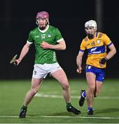 10 January 2024; Shane O'Brien of Limerick in action against Ross Hayes of Clare during the Co-Op Superstores Munster Hurling League Group A match between Clare and Limerick at Clarecastle GAA astro pitch in Clare. Photo by Piaras Ó Mídheach/Sportsfile