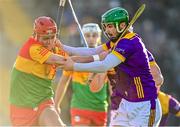 14 January 2024; Niall Bolger of Carlow in action against Richie Lawlor of Wexford during the Dioralyte Walsh Cup Round 3 match between Wexford and Carlow at Chadwicks Wexford Park in Wexford. Photo by Tyler Miller/Sportsfile