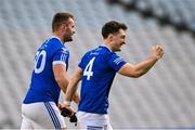 14 January 2024; Arva players Finbar McAvinue, 4, and Seaghán Ward celebrate after their side's victory in the AIB GAA Football All-Ireland Junior Club Championship final match between Arva of Cavan and Listowel Emmets of Kerry at Croke Park in Dublin. Photo by Piaras Ó Mídheach/Sportsfile