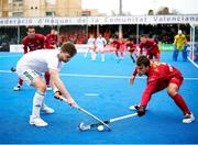 19 January 2024; Lee Cole of Ireland in action against Alejandro Alonso of Spain during the FIH Men's Olympic Hockey Qualifying Tournament semi-final match between Ireland and Spain at Campo de Hockey Hierba Tarongers in Valencia, Spain. Photo by Manuel Queimadelos/Sportsfile