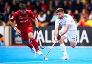 19 January 2024; Shane O'Donoghe of Ireland in action against Jose Basterra of Spain during the FIH Men's Olympic Hockey Qualifying Tournament semi-final match between Ireland and Spain at Campo de Hockey Hierba Tarongers in Valencia, Spain. Photo by Manuel Queimadelos/Sportsfile