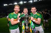 21 January 2024; Glen players, from left, Conor Glass, Danny Tallon and Cahir McCabe celebrate with the trophy after the AIB GAA Football All-Ireland Senior Club Championship Final match between Glen of Derry and St Brigid's of Roscommon at Croke Park in Dublin. Photo by Ramsey Cardy/Sportsfile