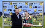 27 January 2024; Lisa Cafferky of Mayo receives the Player of the Match award from Paudie Byrne, Sales Operation Manager, Lidl Ireland, after the 2024 Lidl Ladies National Football League Division 1 Round 2 fixture between Galway and Mayo at Duggan Park in Ballinasloe, Galway. Photo by Piaras Ó Mídheach/Sportsfile