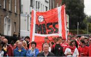 8 September 2013; Cork supporters and with their 'hawkeye' banner ahead of the GAA Hurling All-Ireland Championship Finals, Croke Park, Dublin. Picture credit: Dáire Brennan / SPORTSFILE