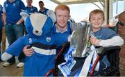 9 September 2013; Keenan Fitzpatrick, age 8, from Gorey, Co. Wexford, holds the Irish Press Cup with Waterford's DJ Foran on a visit by the All-Ireland Minor Hurling Champions to Our Lady's Hospital for Sick Children, Crumlin. Picture credit: Barry Cregg / SPORTSFILE