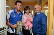 9 September 2013; Waterford captain Kevin Daly, left, with Holly-Mae Murphy and her grandparents Breda and Tom, from Waterford City, and the Irish Press Cup on a visit by the All-Ireland Minor Hurling Champions to Our Lady's Hospital for Sick Children, Crumlin. Picture credit: Barry Cregg / SPORTSFILE