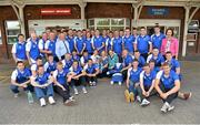 9 September 2013; Waterford players and backroom staff with the Irish Press Cup andh nursing staff on a visit by the All-Ireland Minor Hurling Champions to Our Lady's Hospital for Sick Children, Crumlin. Picture credit: Barry Cregg / SPORTSFILE