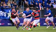 2 February 2024; Evan Moynihan of St Mary’s College is tackled by Max Colbert of Wesley College during the Bank of Ireland Leinster Schools Senior Cup First Round match between St Mary's College and Wesley College at Energia Park in Dublin. Photo by Dáire Brennan/Sportsfile