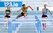 3 February 2024; Okwu Backari of Leevale AC, Cork, centre, competes in the Women's 60m Hurdles during the AAI National Indoor League Final at the TUS Indoor Arena, Athlone in Westmeath. Photo by Ben McShane/Sportsfile