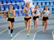 3 February 2024; Amy O'Donoghue of Dundrum South Dublin AC, Dublin, right, and Claire Crowley of Leevale AC, Cork, race to the line in the Women's 800m during the AAI National Indoor League Final at the TUS Indoor Arena, Athlone in Westmeath. Photo by Ben McShane/Sportsfile