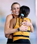 3 February 2024; Jessica Tappin of Clonliffe Harriers AC, Dublin, celebrates with Okwu Backari of Leevale AC, Cork, right, after competing in the Women's 60m Hurdles during the AAI National Indoor League Final at the TUS Indoor Arena, Athlone in Westmeath. Photo by Ben McShane/Sportsfile