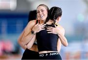 3 February 2024; Jessica Tappin of Clonliffe Harriers AC, Dublin, with Katie Elliot of Letterkenny AC, Galway, right, after competing in the Women's 60m Hurdles during the AAI National Indoor League Final at the TUS Indoor Arena, Athlone in Westmeath. Photo by Ben McShane/Sportsfile