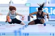 3 February 2024; Rolus Olusa of Clonliffe Harriers AC, Dublin, right, and Conor Penney of Craughwell AC, Galway, compete in the Men's 60m Hurdles during the AAI National Indoor League Final at the TUS Indoor Arena, Athlone in Westmeath. Photo by Ben McShane/Sportsfile