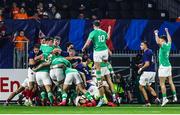 3 February 2024; Ireland players celebrate as teammate Danny Sheahan scores their side's first try during the U20 Six Nations Rugby Championship match between France and Ireland at Stade Maurice David in Aix-en-Provence, France. Photo by Johnny Fidelin/Sportsfile