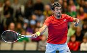 3 February 2024; Sebastian Ofner of Austria in action against Osgar Ó hOisín of Ireland during their singles match on day one of the Davis Cup World Group I Play-off 1st Round match between Ireland and Austria at UL Sport Arena in Limerick. Photo by Brendan Moran/Sportsfile