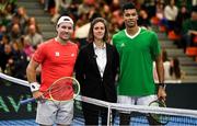 4 February 2024; Lucas Miedler of Austria, left, and Michael Agwi of Ireland with umpire Floriane Dierckx before their singles match on day two of the Davis Cup World Group I Play-off 1st Round match between Ireland and Austria at UL Sport Arena in Limerick. Photo by Brendan Moran/Sportsfile