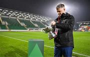 9 February 2024; Cliff Henry, League of Ireland operations manager, prepares the cup before the 2024 Men's President's Cup match between Shamrock Rovers and St Patrick's Athletic at Tallaght Stadium in Dublin. Photo by Stephen McCarthy/Sportsfile