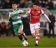 9 February 2024; Kian Leavy of St Patrick's Athletic in action against Dylan Watts of Shamrock Rovers during the 2024 Men's President's Cup match between Shamrock Rovers and St Patrick's Athletic at Tallaght Stadium in Dublin. Photo by Stephen McCarthy/Sportsfile