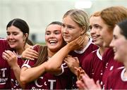 10 February 2024; Kate McClusky of Marino, second from left, celebrates with team-mate Rose Sheridan after their side's victory in the Electric Ireland Ashling Murphy Cup final match between Ulster University Magee and Marino at University of Galway Connacht GAA Centre of Excellence in Bekan, Mayo. Photo by Piaras Ó Mídheach/Sportsfile