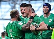 11 February 2024; Dan Sheehan of Ireland, centre, celebrates with team-mate Andrew Porter, left, after scoring their side's fourth try during the Guinness Six Nations Rugby Championship match between Ireland and Italy at the Aviva Stadium in Dublin. Photo by Piaras Ó Mídheach/Sportsfile