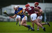 11 February 2024; Seán Ryan of Tipperary is tackled by TJ Brennan, 3, and Ronan Glennon of Galway during the Allianz Hurling League Division 1 Group B match between Tipperary and Galway at FBD Semple Stadium in Thurles, Tipperary. Photo by Ray McManus/Sportsfile